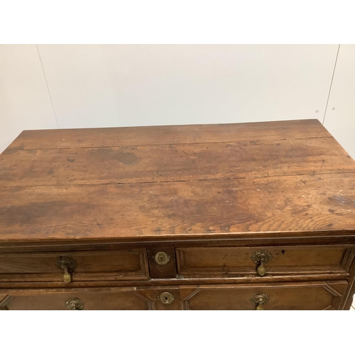 1179 - A 17th century and later oak chest of drawers, geometric moulding, raised on bun feet, width 102cm, ... 