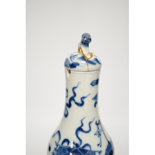 1251 - A late 19th century Chinese blue and white double gourd vase and cover 26cm high