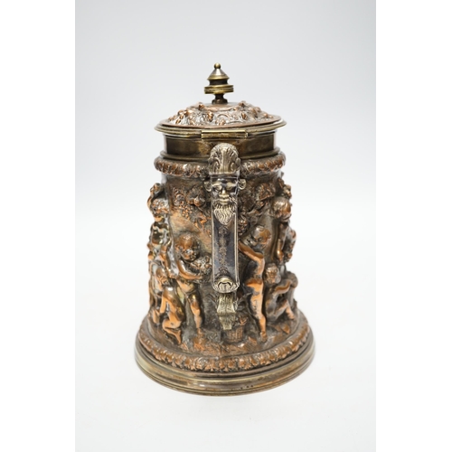 1256 - A Victorian electrotype relief putti jug with hinged cover. 24cm high