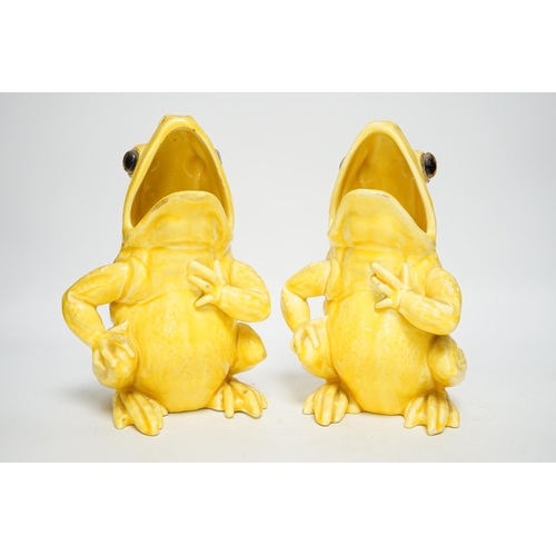 1258 - A pair of Continental yellow glazed pottery frogs, 21.5cm