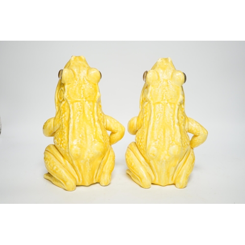 1258 - A pair of Continental yellow glazed pottery frogs, 21.5cm