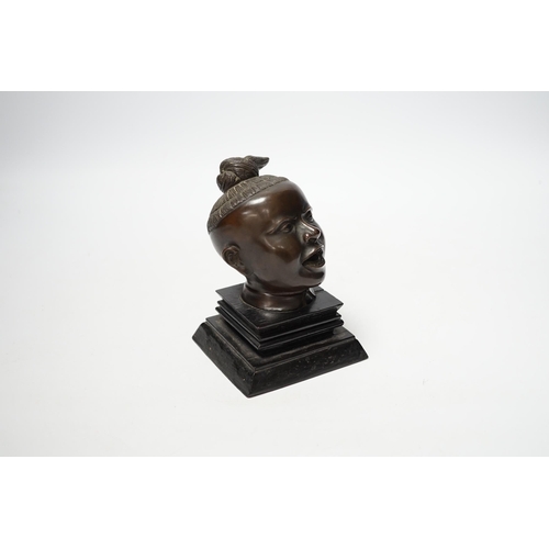 1264 - A Malaysian bronze head of a boy, 12.5cm high