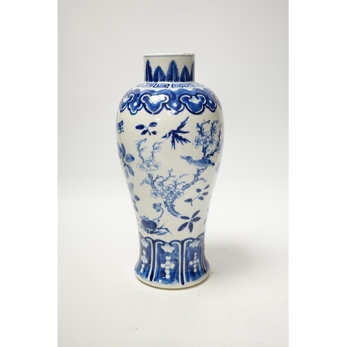 1284 - A Chinese blue and white baluster vase decorated with birds and flowers, late 19th century, 27cm hig... 