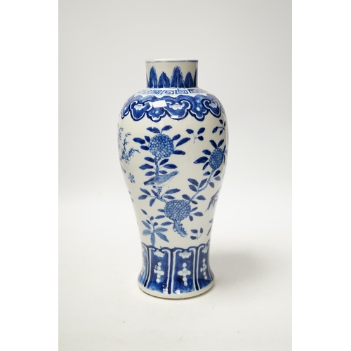 1284 - A Chinese blue and white baluster vase decorated with birds and flowers, late 19th century, 27cm hig... 