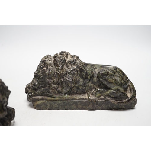 1290 - A pair of carved serpentine models of the Lucerne lions, 16cm wide