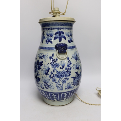 1298 - A late 19th century Chinese export porcelain blue and white Hu vase, painted with peaches (converted... 