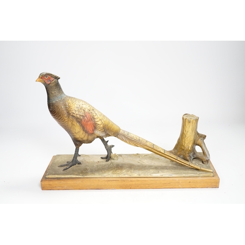 1335 - A cold painted spelter table striker, in the form of a pheasant, 31.5cm wide