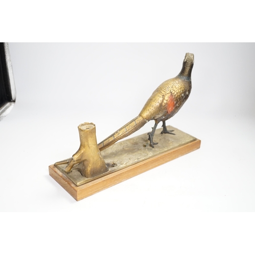 1335 - A cold painted spelter table striker, in the form of a pheasant, 31.5cm wide