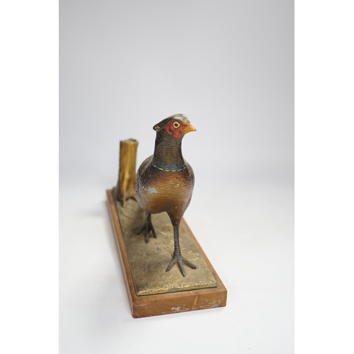 1335 - A cold painted spelter table striker, in the form of a pheasant, 31.5cm wide