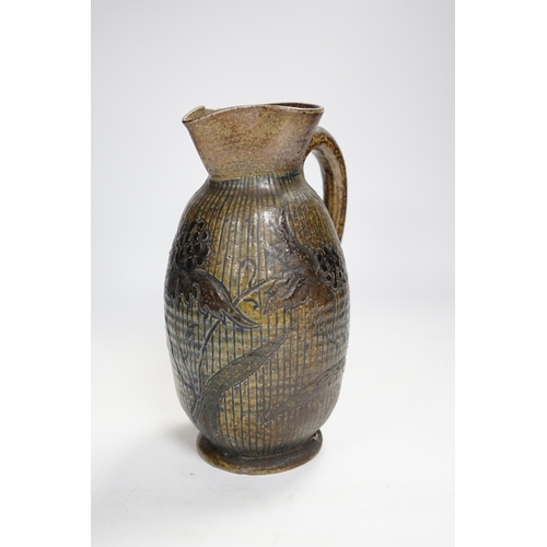 1337 - A R W Martin Brothers, London and Southall stoneware jug, repaired, mark to base, 22cm high