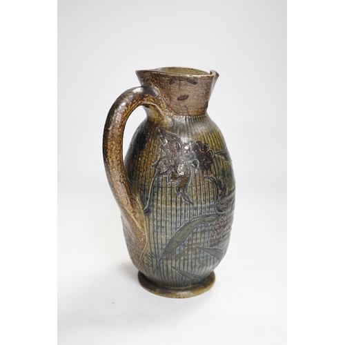 1337 - A R W Martin Brothers, London and Southall stoneware jug, repaired, mark to base, 22cm high