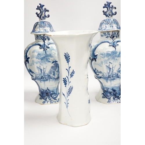 1340 - A Delft garniture of three vases, c.1770, tallest 41cm high