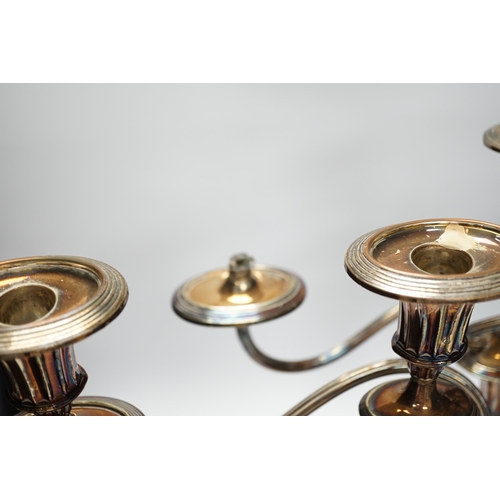 1353 - A pair of silver plate two branch candelabra