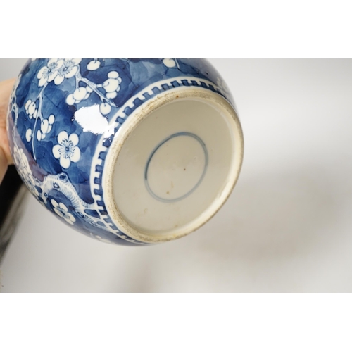 1363 - A 19th century Chinese blue and white prunus jar and cover, together with two similar tiles, jar 21c... 