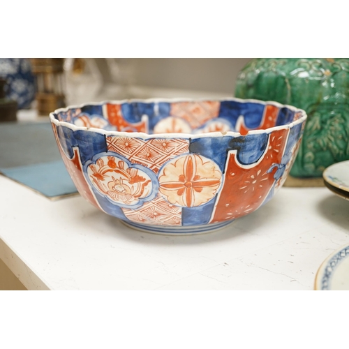 1365 - A group of mostly Chinese and Japanese ceramics, 18th century and later together with a Delft plate,... 