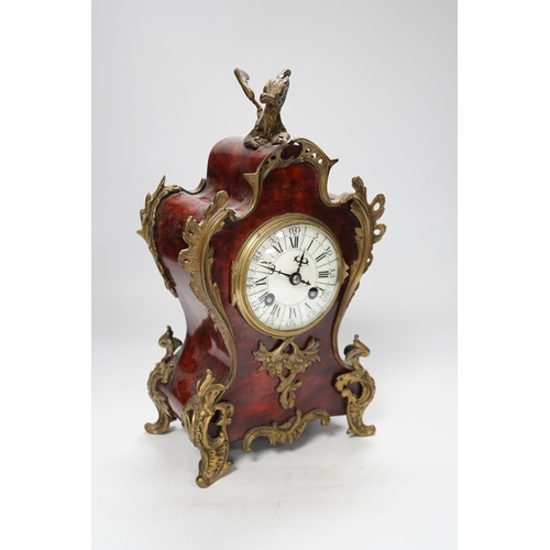 1369 - An early 20th century French red tortoiseshell veneered mantel clock with dragon mount, 30cm