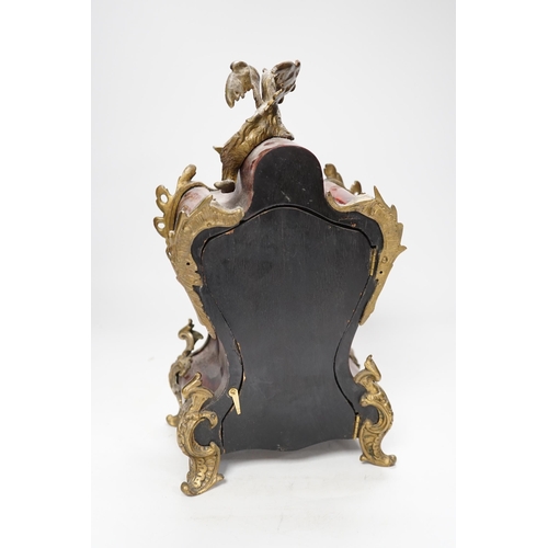 1369 - An early 20th century French red tortoiseshell veneered mantel clock with dragon mount, 30cm