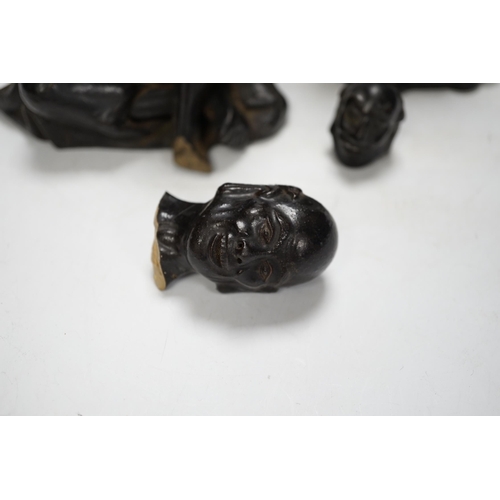 1371 - Two Chinese pottery figures of luohan, damaged, 15.5cm