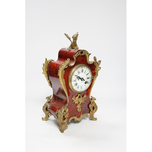 1374 - An early 20th century French tortoiseshell mantel clock with dragon mount, 30cm