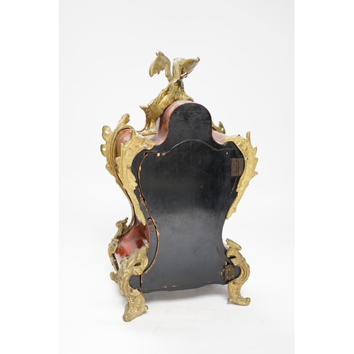 1374 - An early 20th century French tortoiseshell mantel clock with dragon mount, 30cm