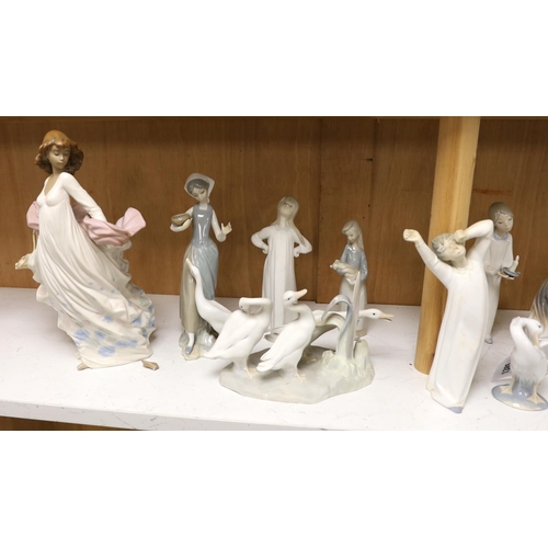 1385 - Twenty pieces of Lladro and Nao porcelain, tallest 31cm