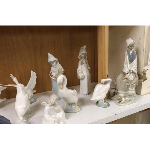 1385 - Twenty pieces of Lladro and Nao porcelain, tallest 31cm