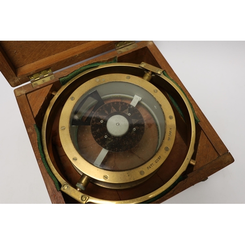 1407 - A cased brass compass impressed PATT 029P, 24cm in diameter