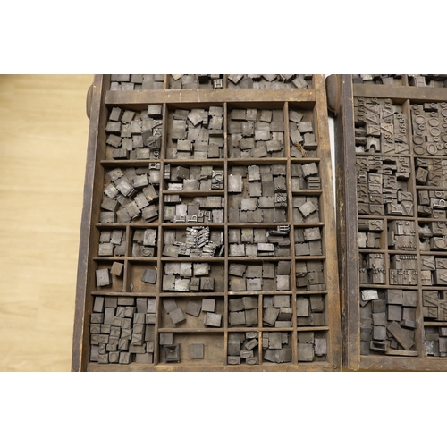 1428 - Three trays of metal printing type: chases, quoins and spacing bars