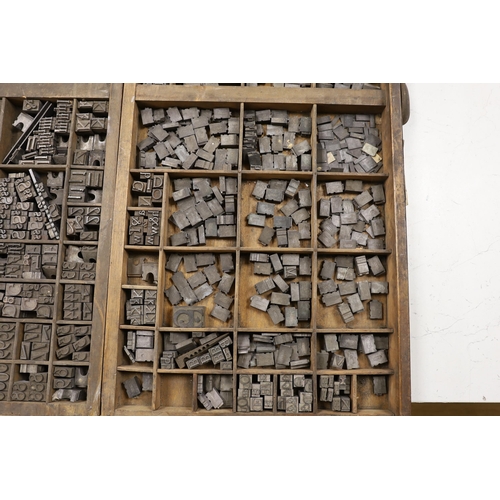 1428 - Three trays of metal printing type: chases, quoins and spacing bars