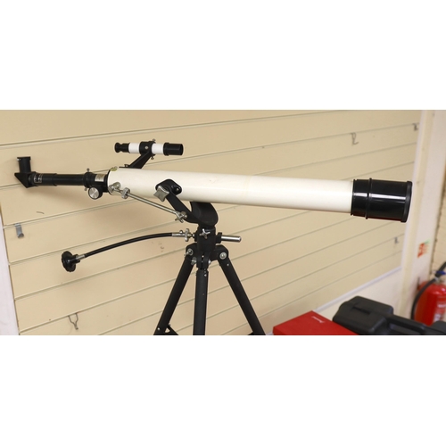 1436 - A telescope on tripod stand and a Meade scope and tripod, telescope and stand 105cm high