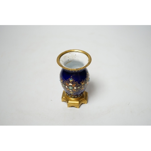 1437 - A small 19th century French jewelled blue enamel and ormolu vase, 8cm