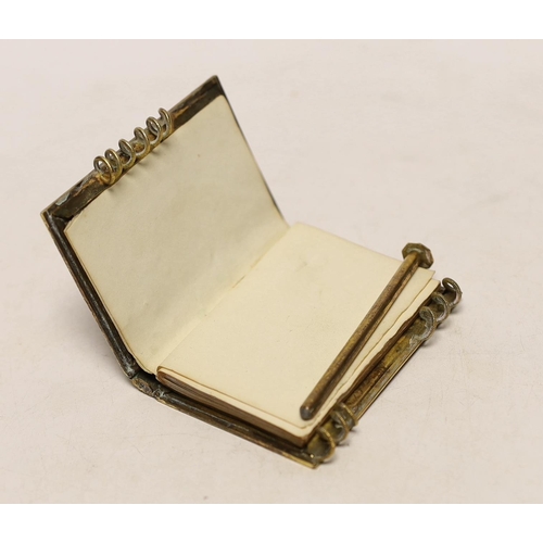 1448 - A gilt metal and mother of pearl mounted aide memoire, 7cm high