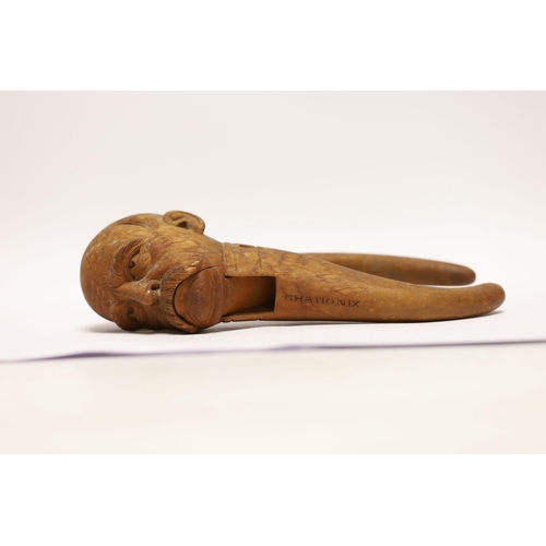 1452 - A Treen nutcracker in the form of a gentleman, inscribed Chamonix, 20cm high