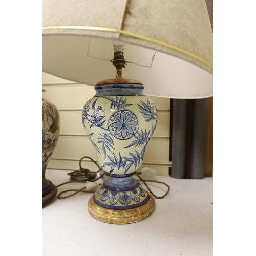 1459 - A pair of Chinese crackleware lamps, 40cm high, and a European pottery lamp (3)