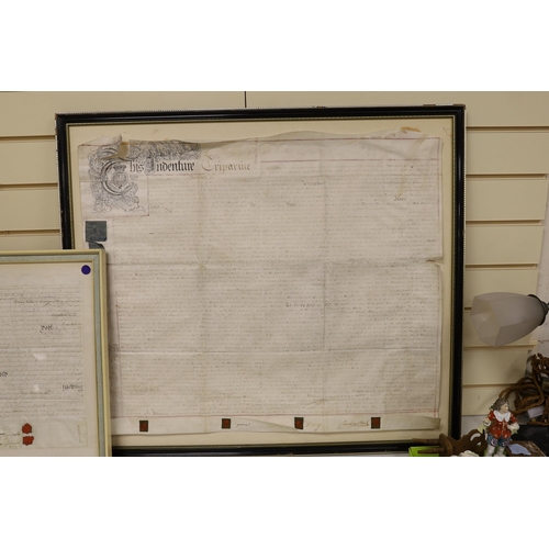 1460 - Two framed 18th century indentures, on vellum, largest 75cm wide x 63cm high