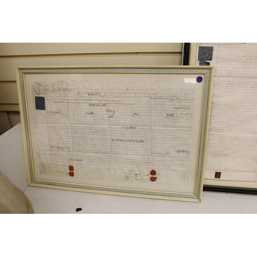 1460 - Two framed 18th century indentures, on vellum, largest 75cm wide x 63cm high