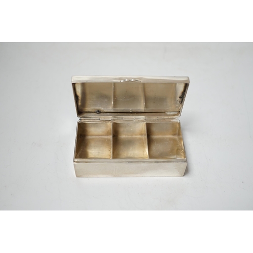 1903 - A continental white metal triple compartment rectangular stamp box(ex surmount?), 72mm.