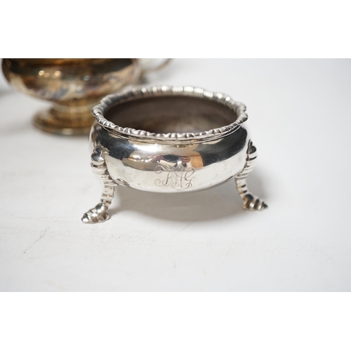 1924 - A collection of small silver items to include a pair of Georgian cauldron salts, two mustard pots in... 