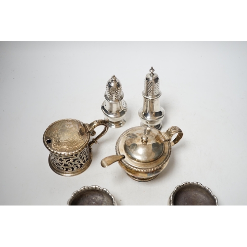 1924 - A collection of small silver items to include a pair of Georgian cauldron salts, two mustard pots in... 