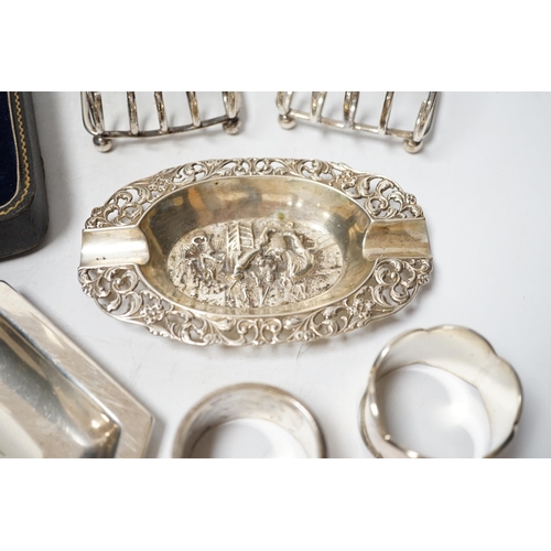 1926 - A Dutch white metal ashtray, with pierced border, 13.1cm and one other silver hexagonal ashtray?, a ... 