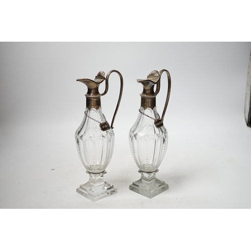 1929 - A pair of late 18th/early 19th century silver mounted cut glass cut glass cruet bottles with labels ... 