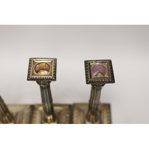 1937 - A set of four late Victorian silver cluster column candlesticks, Atkin Brothers, Sheffield, 1894, he... 