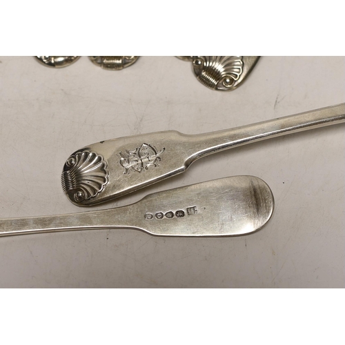 1940 - A harlequin set of seven early 19th century silver fiddle and shell pattern table spoons, various da... 