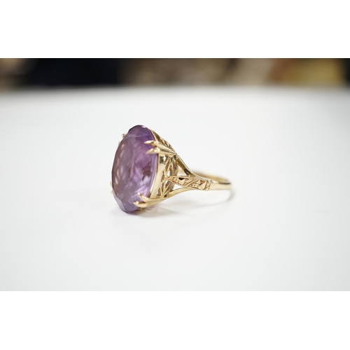 1978 - A modern 9ct gold and oval cut amethyst set dress ring, size M, gross weight 5.9 grams.