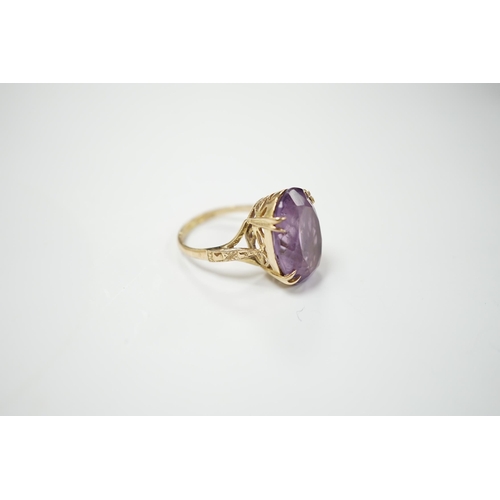 1978 - A modern 9ct gold and oval cut amethyst set dress ring, size M, gross weight 5.9 grams.