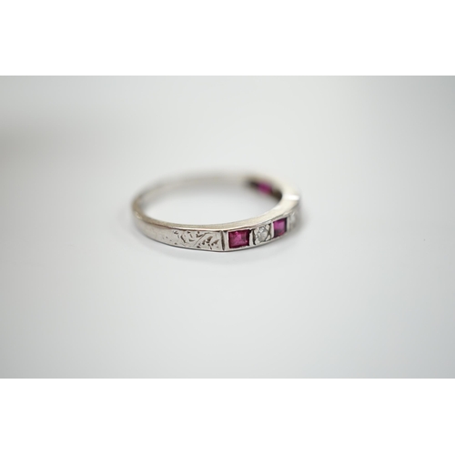 1981 - A modern 18ct white gold, ruby and diamond set half eternity ring, size O, gross weight 2.7 grams.... 