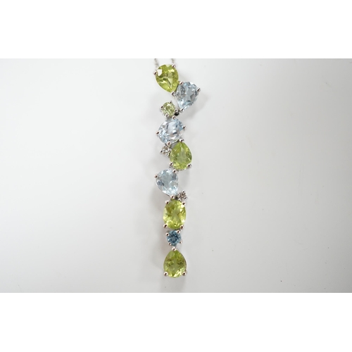 1983 - A modern 9ct white gold, peridot and blue topaz set pendant, 37mm, on a 375 chain, 40cm, gross weigh... 