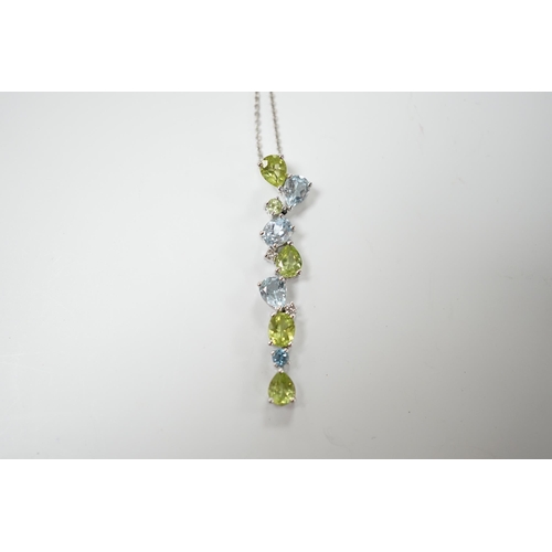 1983 - A modern 9ct white gold, peridot and blue topaz set pendant, 37mm, on a 375 chain, 40cm, gross weigh... 