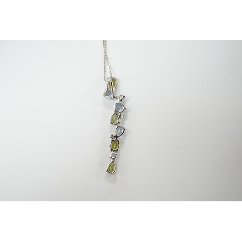 1983 - A modern 9ct white gold, peridot and blue topaz set pendant, 37mm, on a 375 chain, 40cm, gross weigh... 