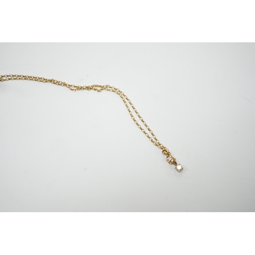 1995 - A modern 9ct gold and solitaire diamond set pendant, 9mm, on a 9ct chain, 38cm, gross weight 2.2 gra... 